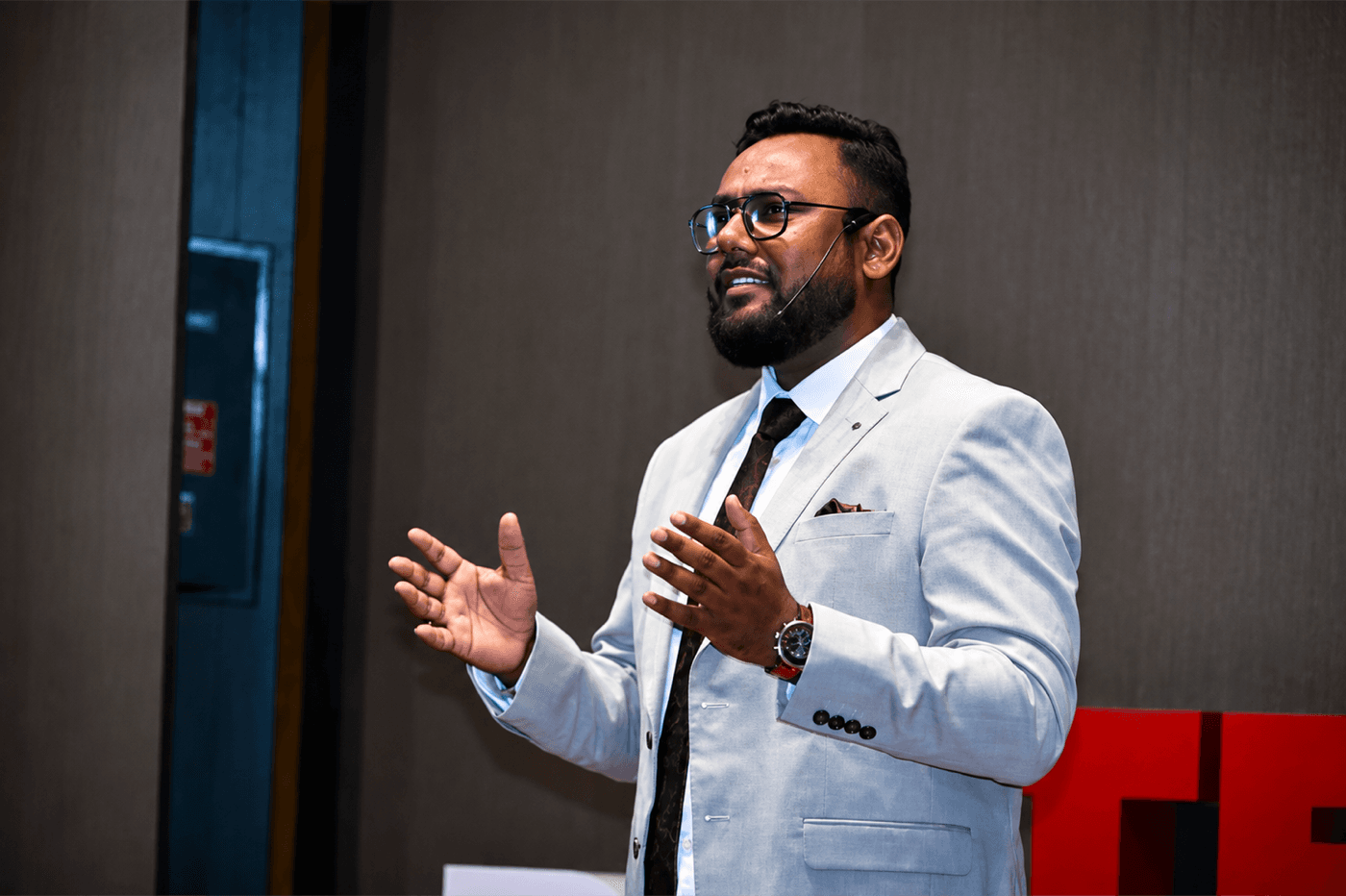 Rahul Kumar speaking on stage